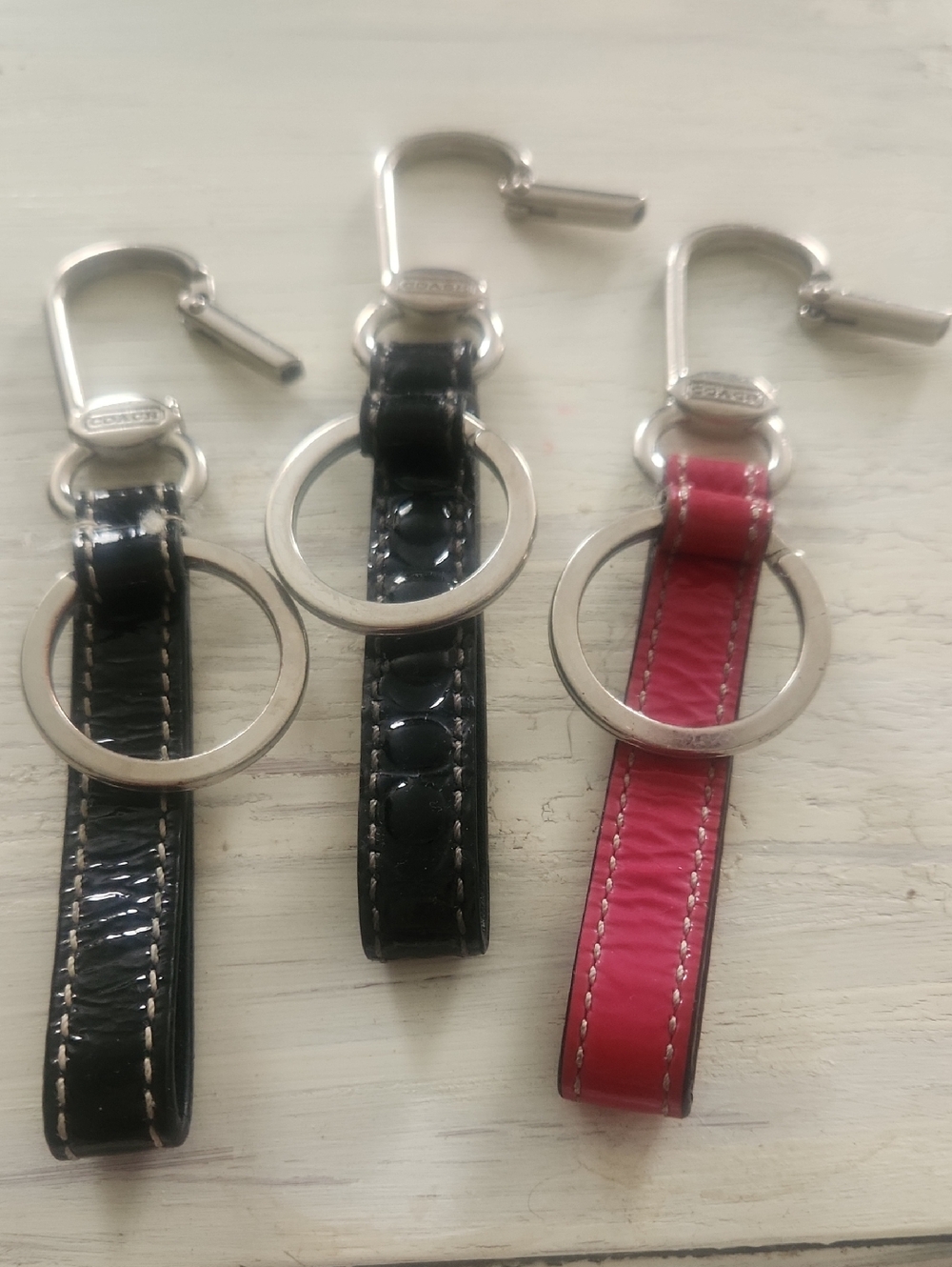 Coach Leather Key Ring Trio in Black and Pink